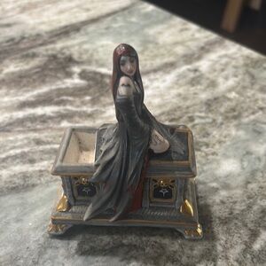Gothic Figurine with Gold Accents